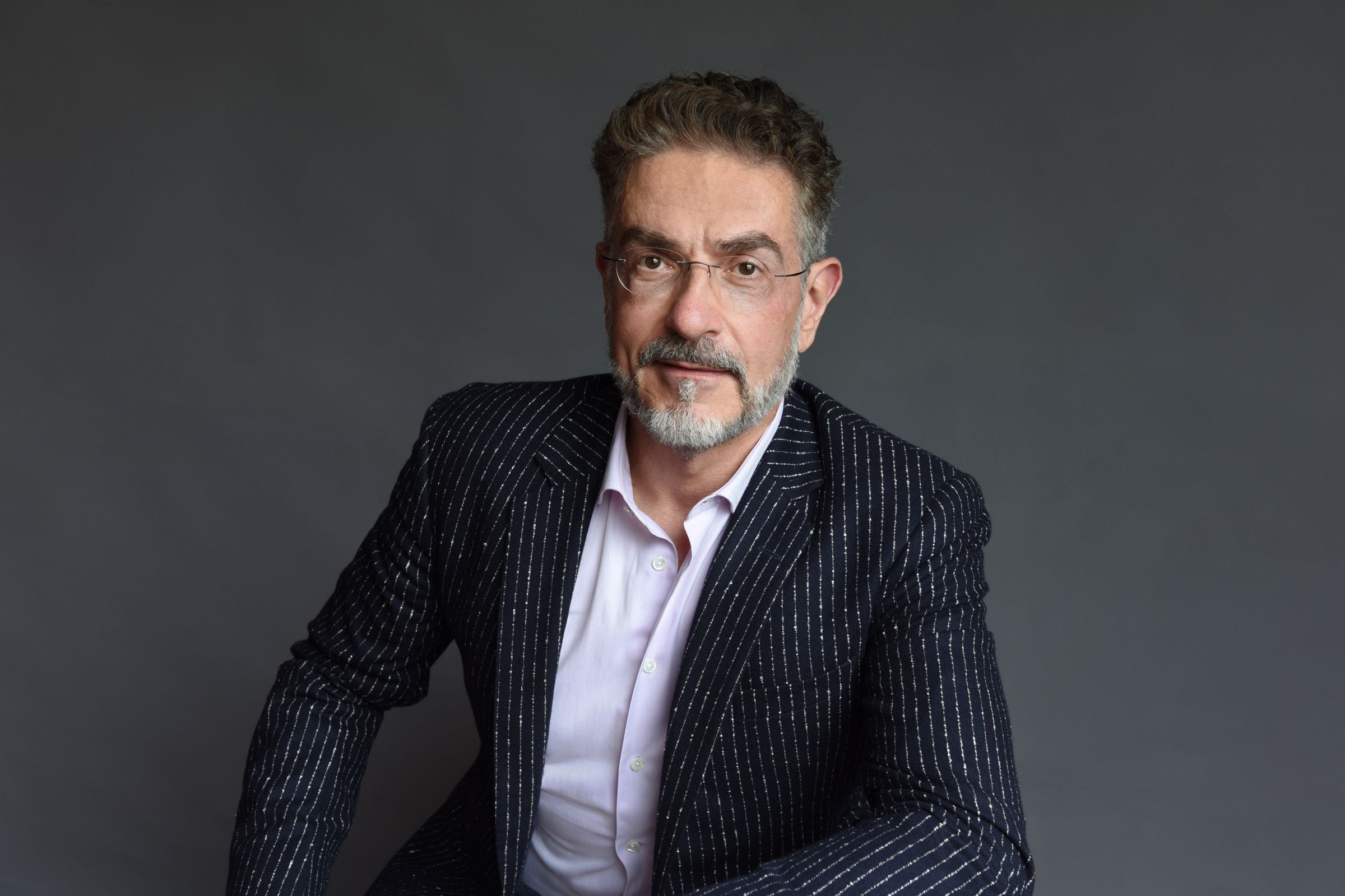 Michael Wiedmann, président du directoire d’IKB, assis, veste sombre, regard vers l’objectif